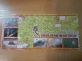 Mapa maratonu na orientację z zaznaczonymi punktami kontrolnymi. Widoczne zdjęcia z trasy i charakterystyczny smok. 10 pik znaczenie.